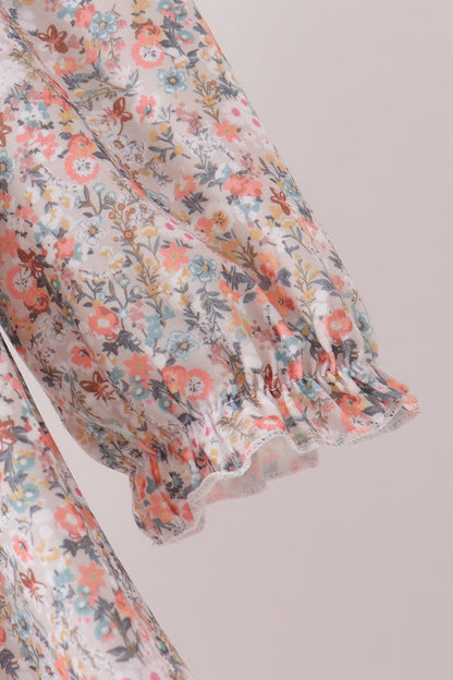 Floral smocked lace dress